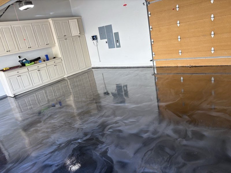 Glossy Smoke metallic epoxy floor in a three-car garage, McKinney TX