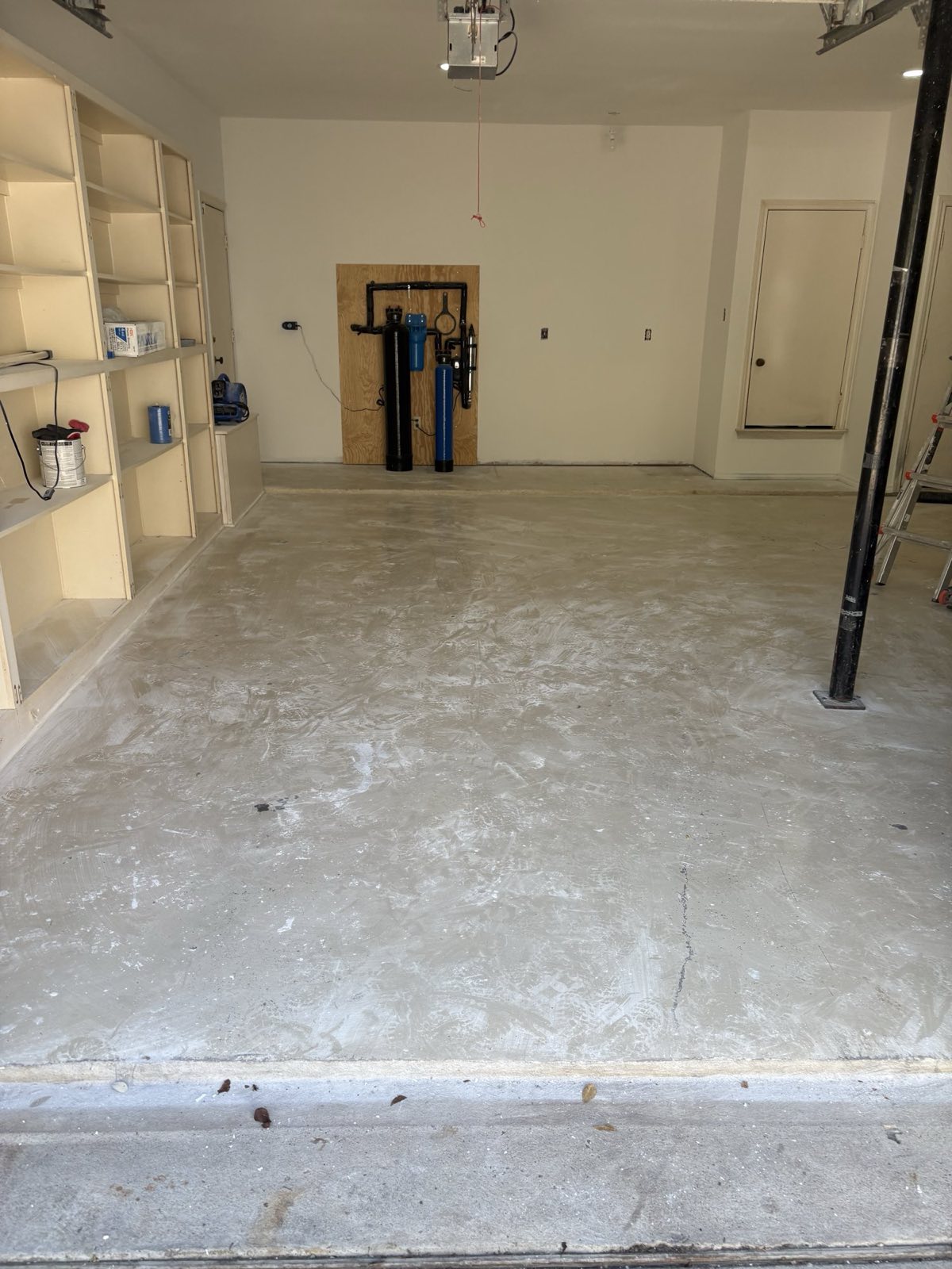 Before: bare concrete garage floor in Van Alstyne TX
