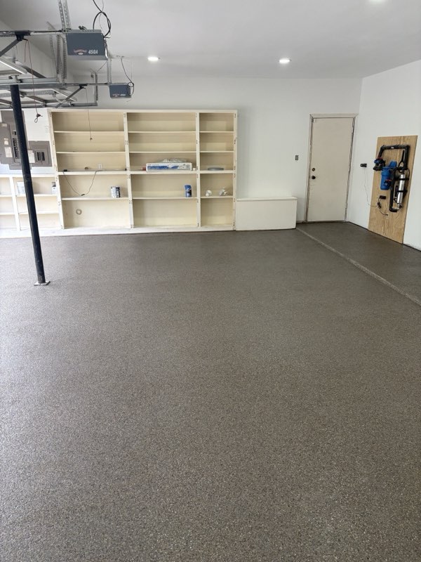 Obsidian flake epoxy floor in a large garage, Van Alstyne TX