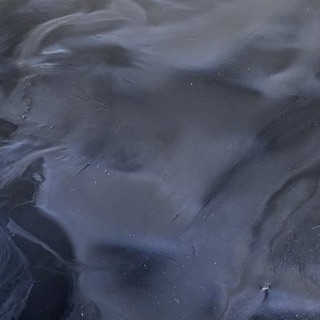 Close-up of Smoke metallic epoxy from our McKinney job